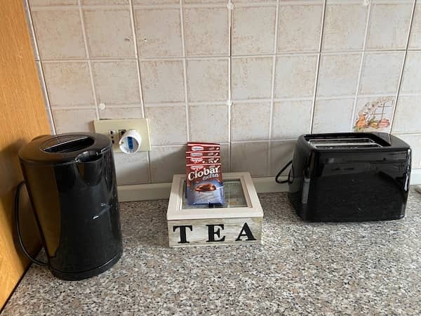 Tastefully furnished bedroom in a holiday flat in Rome